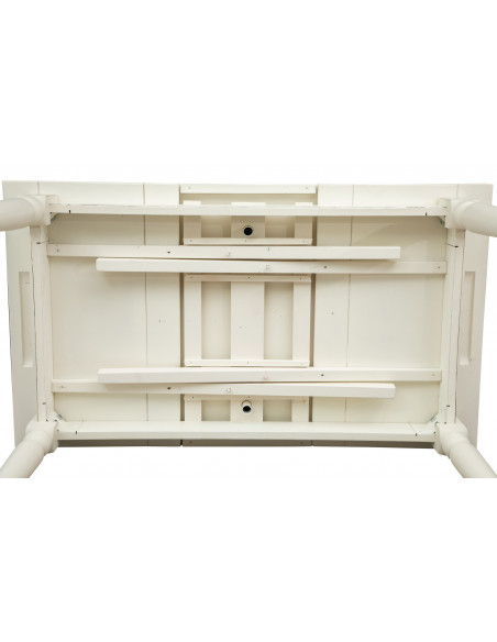 Shabby extendable table in white finish wood seen from below. By Biscottini