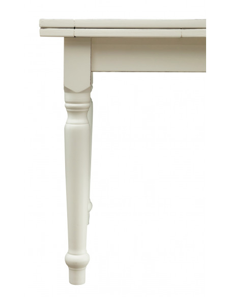 Shabby mesa extensible en madera blanca: detalle de la pierna. Por Biscottini