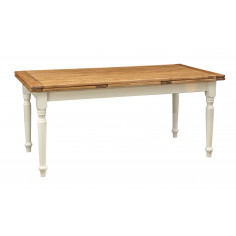Tavolo bianco-naturale  in legno massello con due allunghe laterali.